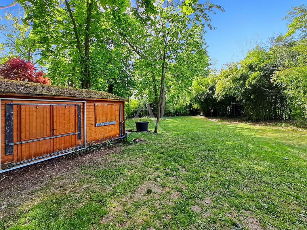 Maison de Caractère sur un Magnifique Terrain Arboré de plus de 4 000 m² - photo 17