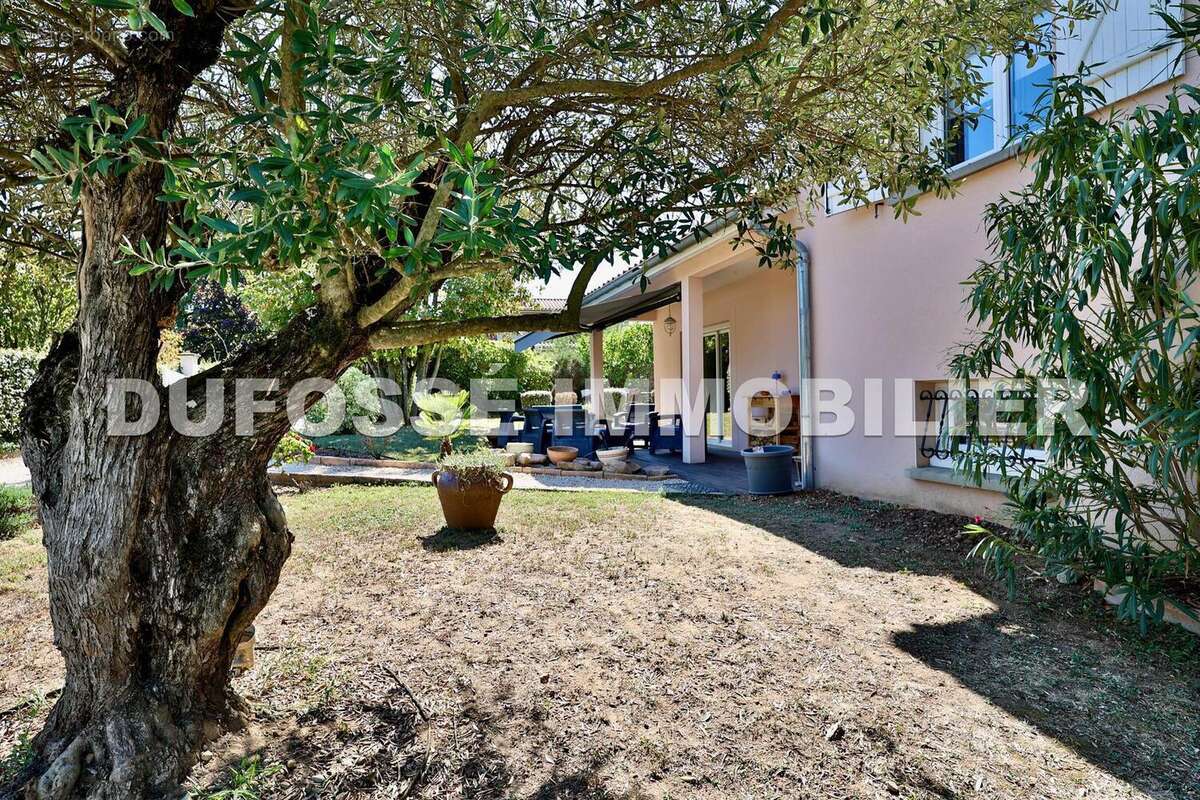 Photo 2 - Maison à SAINT-GENIS-LAVAL