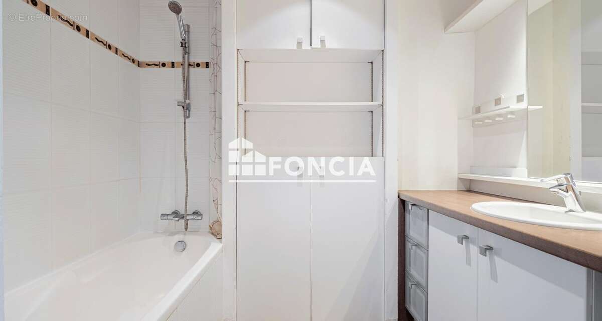 Centre ville - APPARTEMENT T3 avec balcon et caveau - photo 7