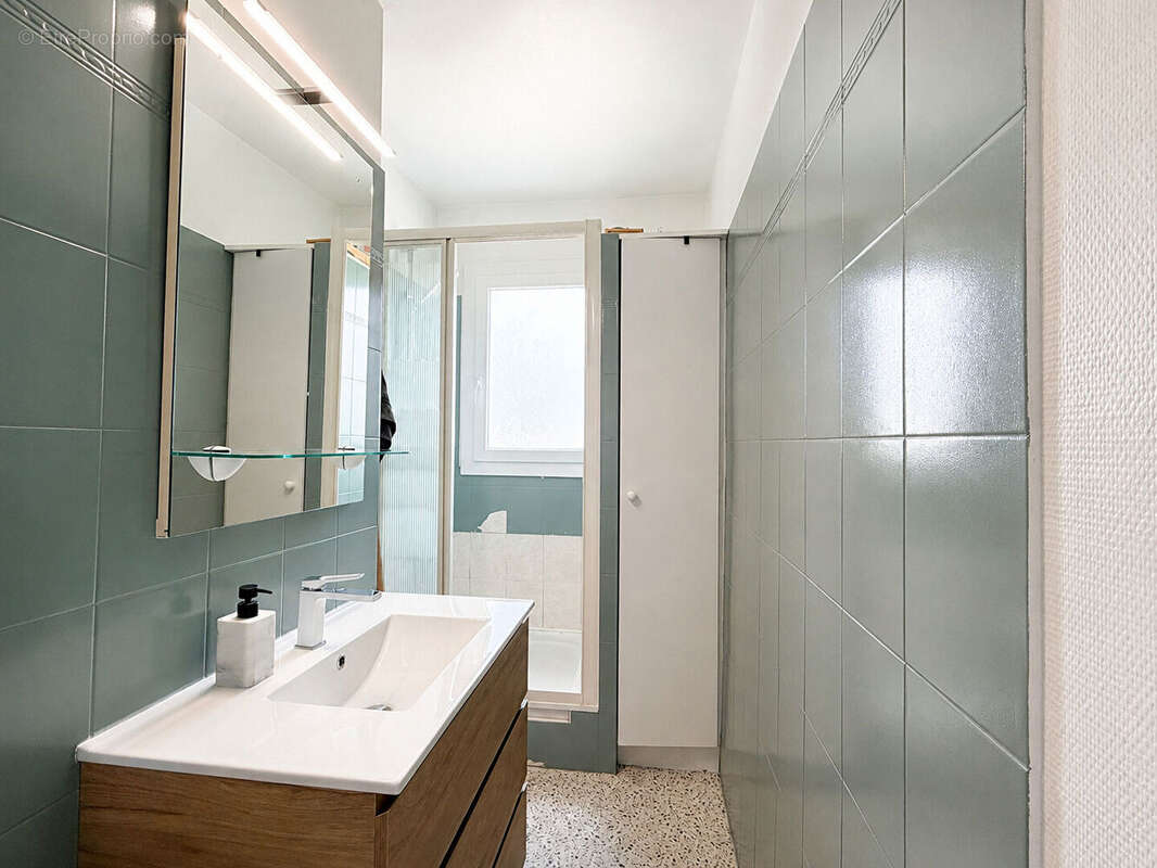 TOUT À PIED - Bel appartement rénové de 94 m² avec terrasse & garage - photo 7