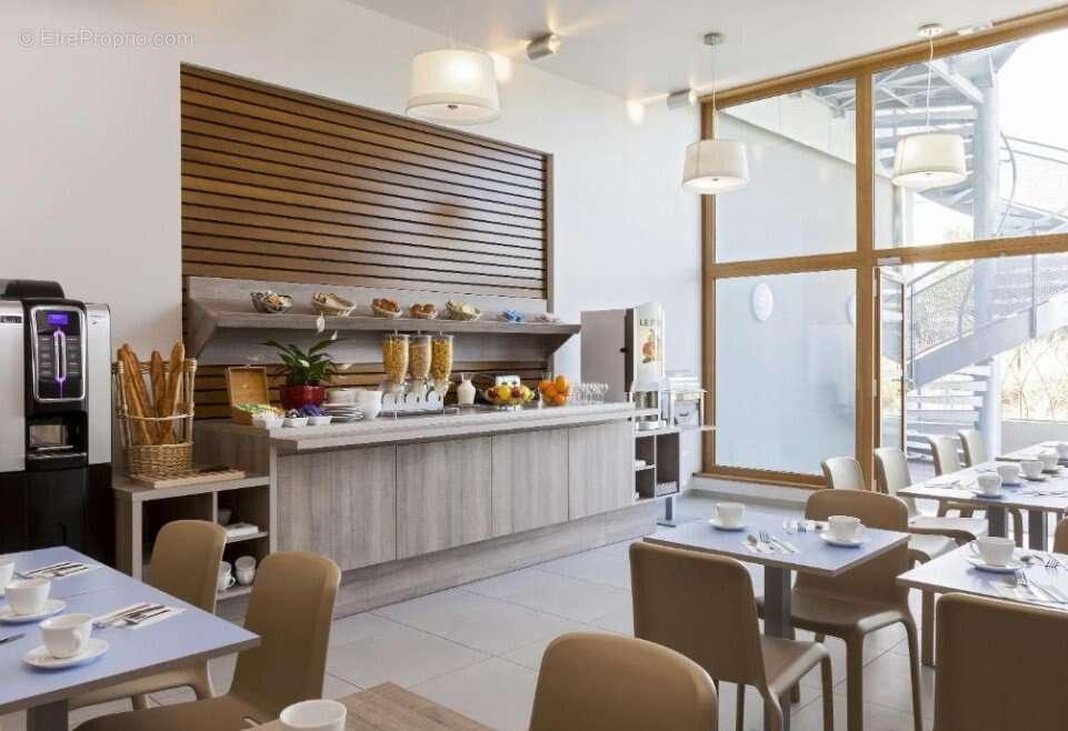 INVESTISSEMENT LOCATIF  ANNEMASSE  Résidence de Tourisme Nehô Suites  Porte de Genève  6,98 % de rentabilité - photo 5