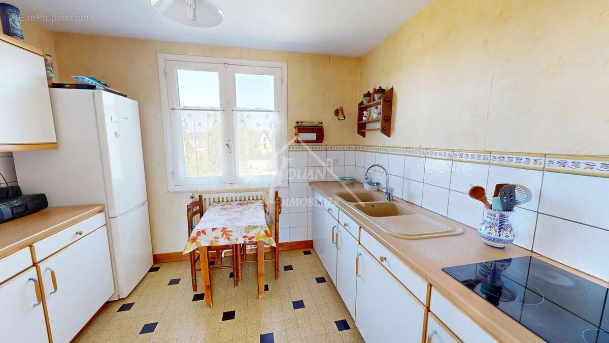Pavillon de plain-pied sur sous-sol avec 1 300 m² de terrain à Bourbon-l'Archambault - photo 8
