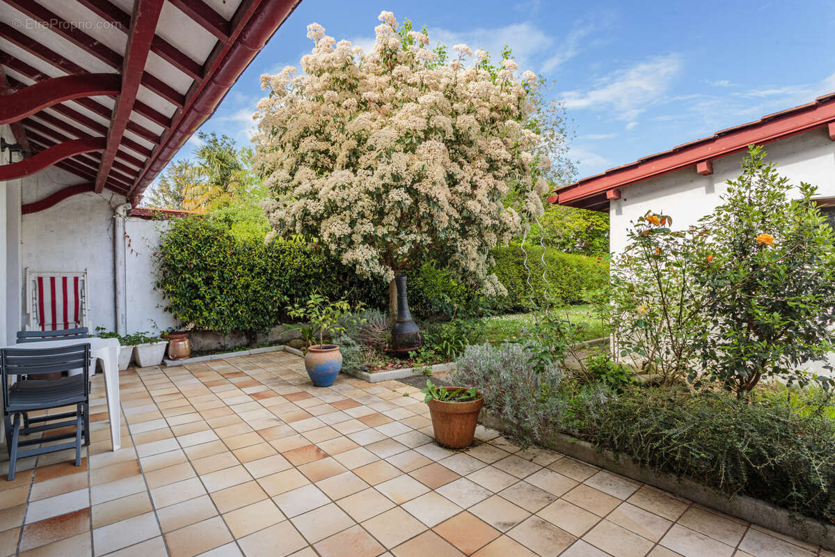 Maison mitoyenne T4 avec jardin et garage - photo 8