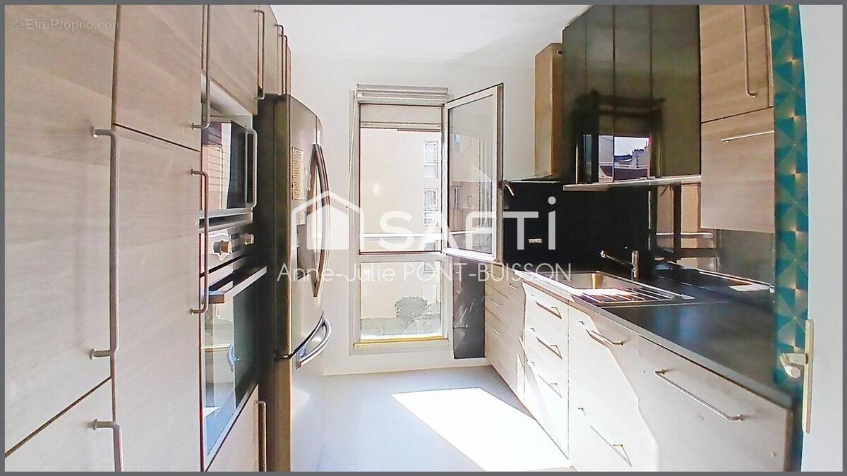 Photo 1 - Appartement à COURBEVOIE