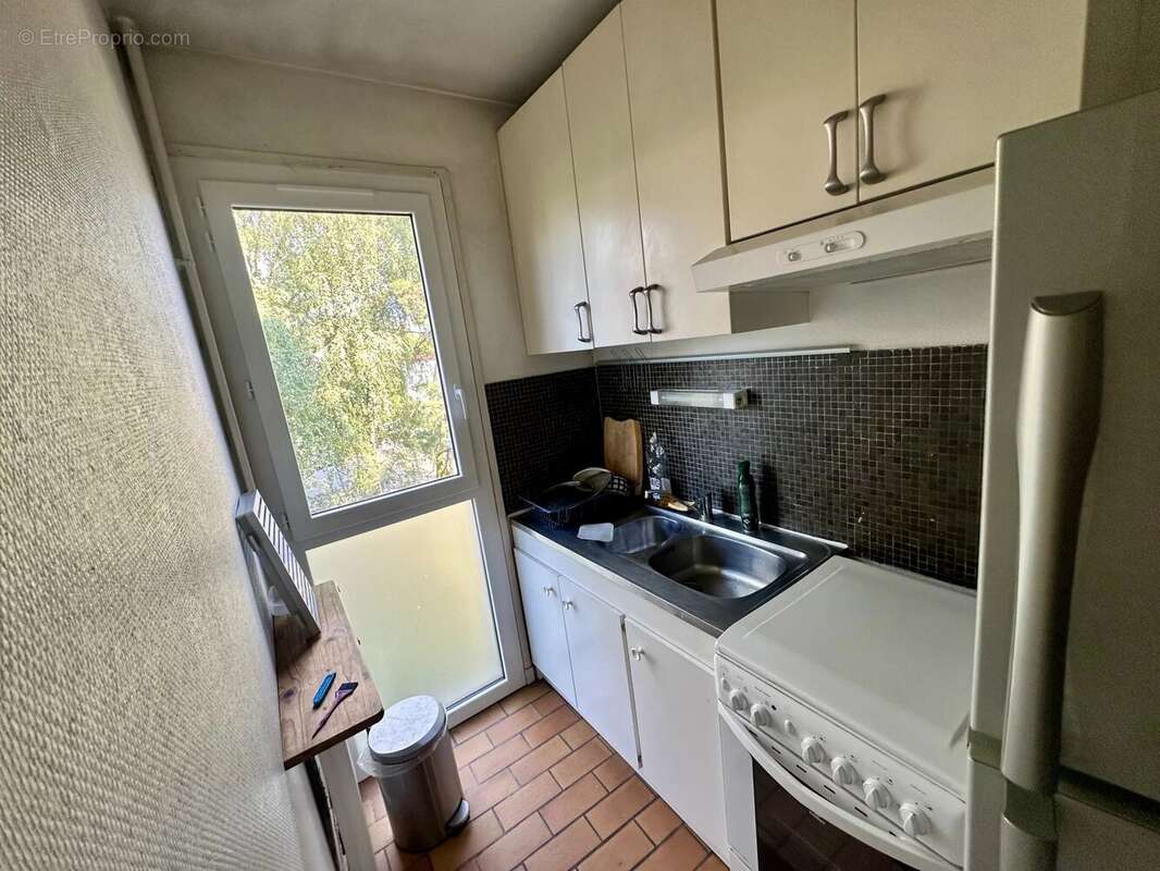 Grenoble – Rue Léon Jouhaux - T2 avec balcon, cave et stationnement privatif - photo 8