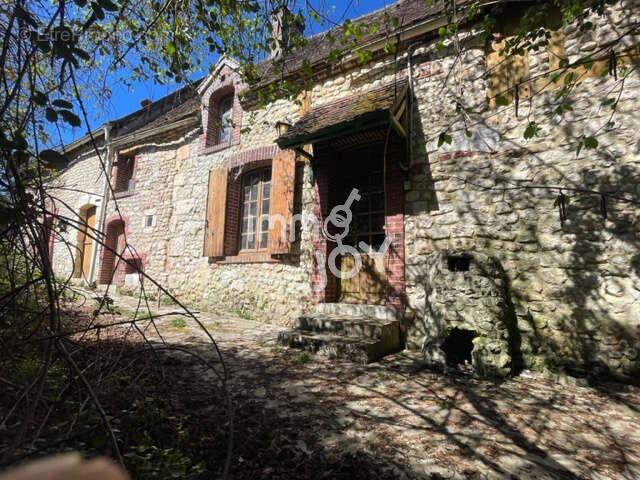 Maison à CONDE-SUR-HUISNE