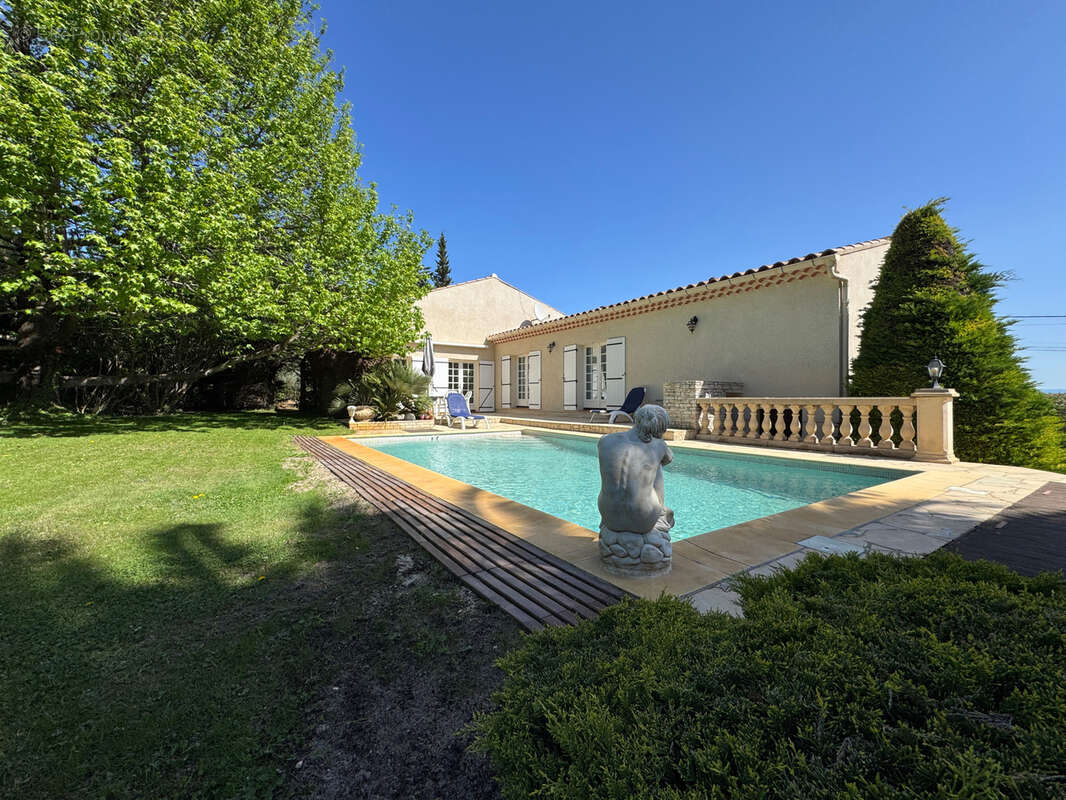 Maison à LAUDUN-L'ARDOISE