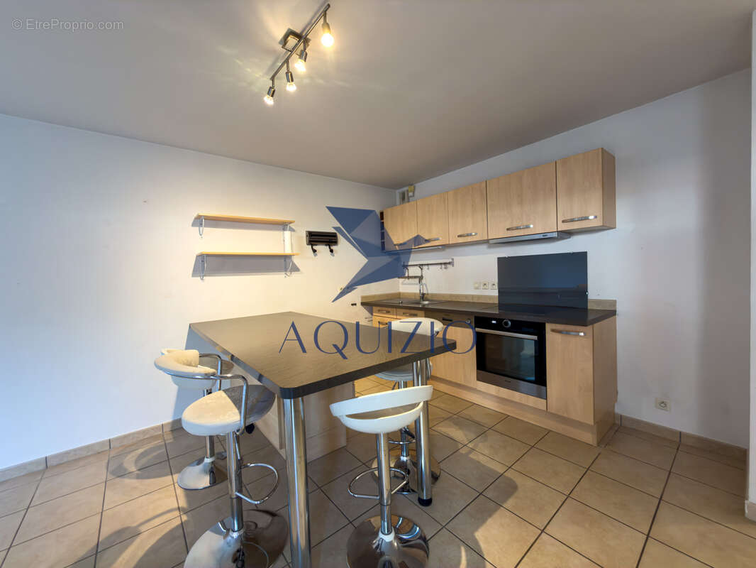 Appartement T3 en rez de jardin avec grande terrasse - photo 3