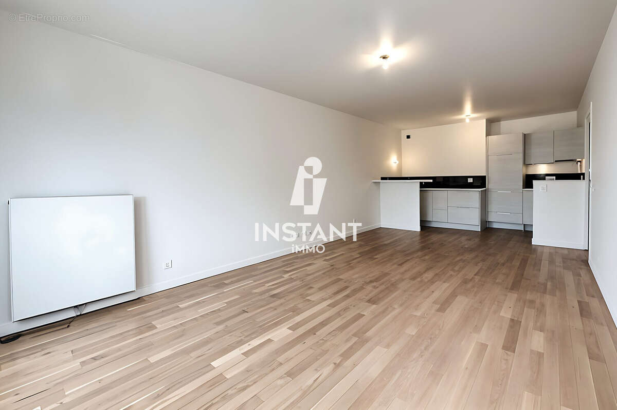 Salon/Cuisine - Appartement à ASNIERES-SUR-SEINE
