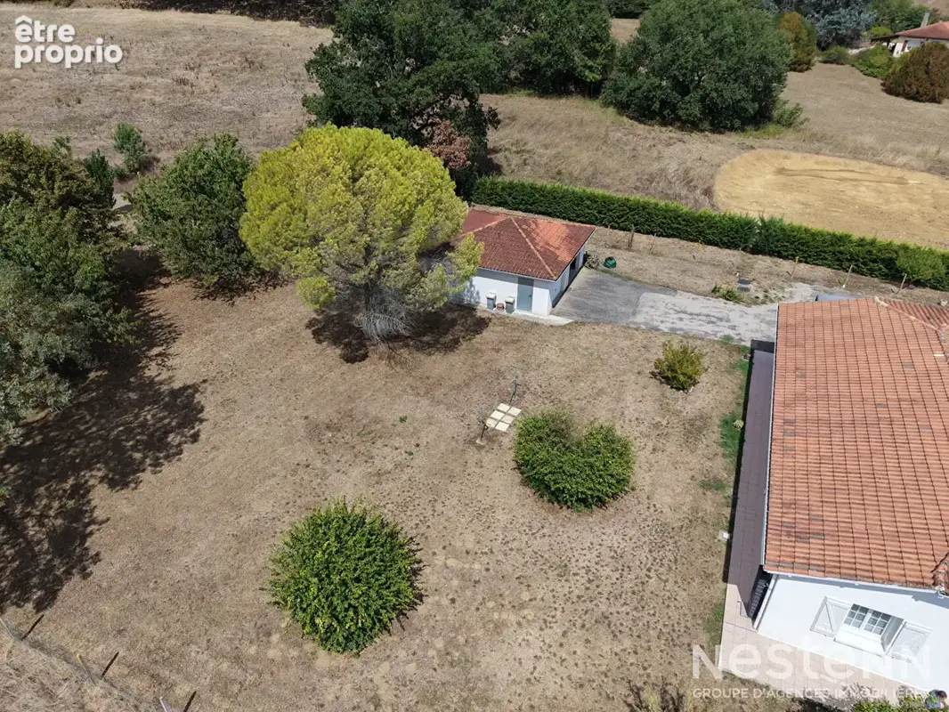 A Vendre Maison de plain-pied de 136 m² avec double garage sur terrain arboré d'environ 4 800 m² - photo 19