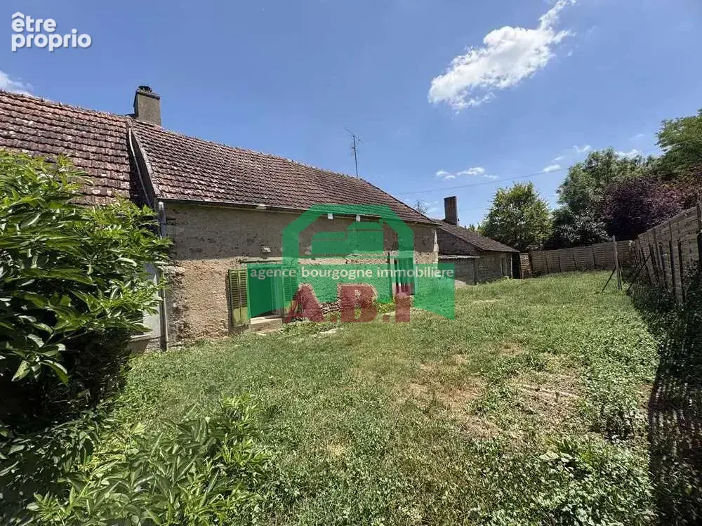 58, à 10mns Clamecy dans le charmant village de Asnois Propriété en pierre de pays avec dépendances sur 510m2 - photo 2