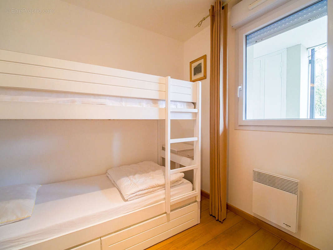 Appartement type T3 refait à neuf au pied du lac - photo 6