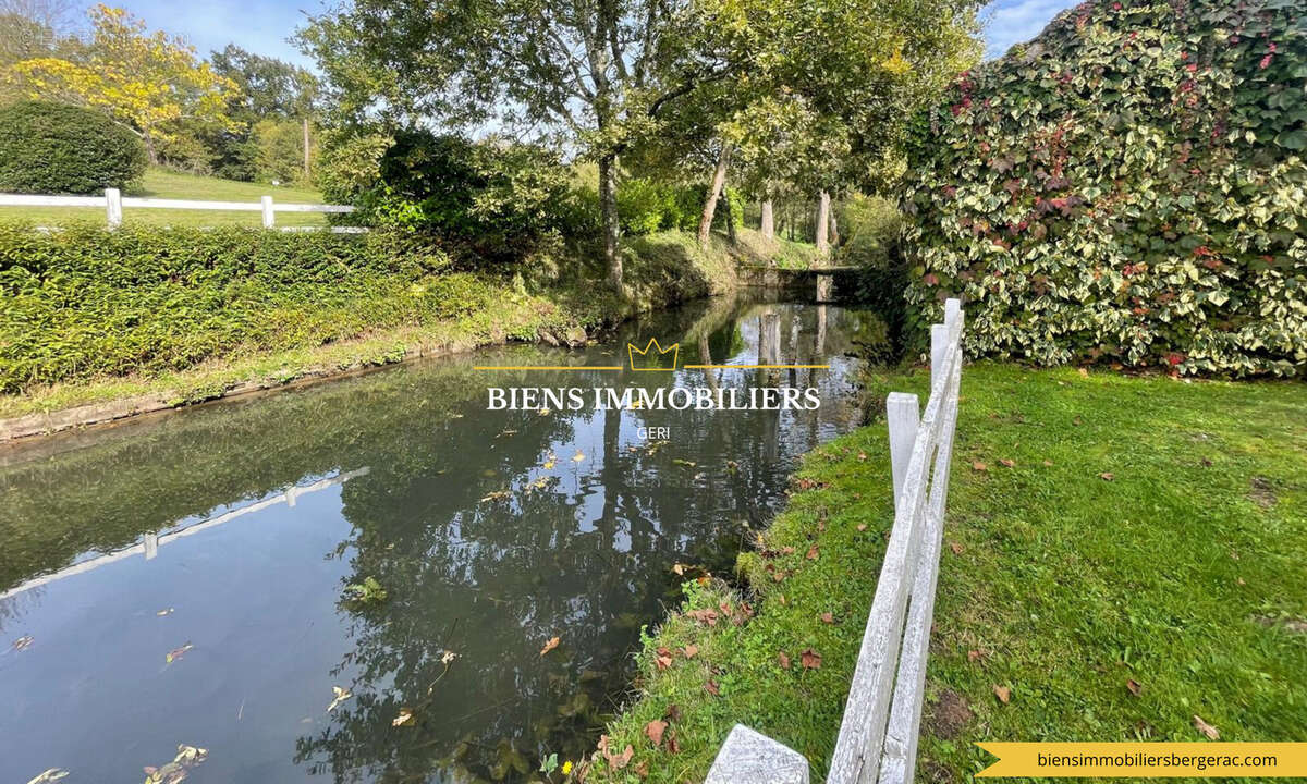 Ancien moulin de caractère avec parc et dépendances - photo 20