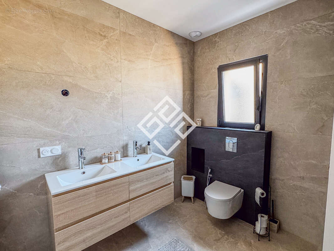 Une élégante villa contemporaine de plain-pied - photo 13