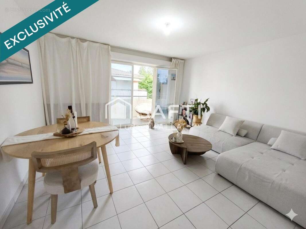 Photo 2 - Appartement à PAREMPUYRE