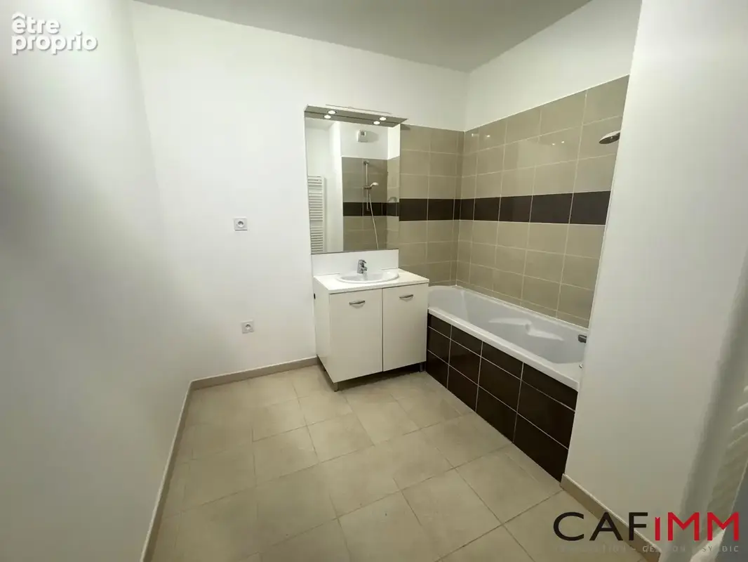 Appartement 3 pièces 63 m² à vendre à Decines-Charpieu (69150) - photo 9