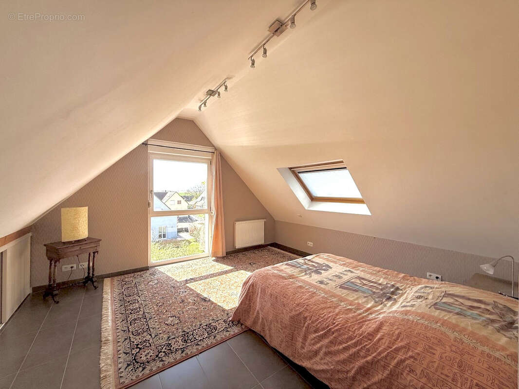 Berstett - L’esprit maison dans une petite copropriété   5 pièces de 141,63 m2 avec jardin, terrasse, garage - photo 20