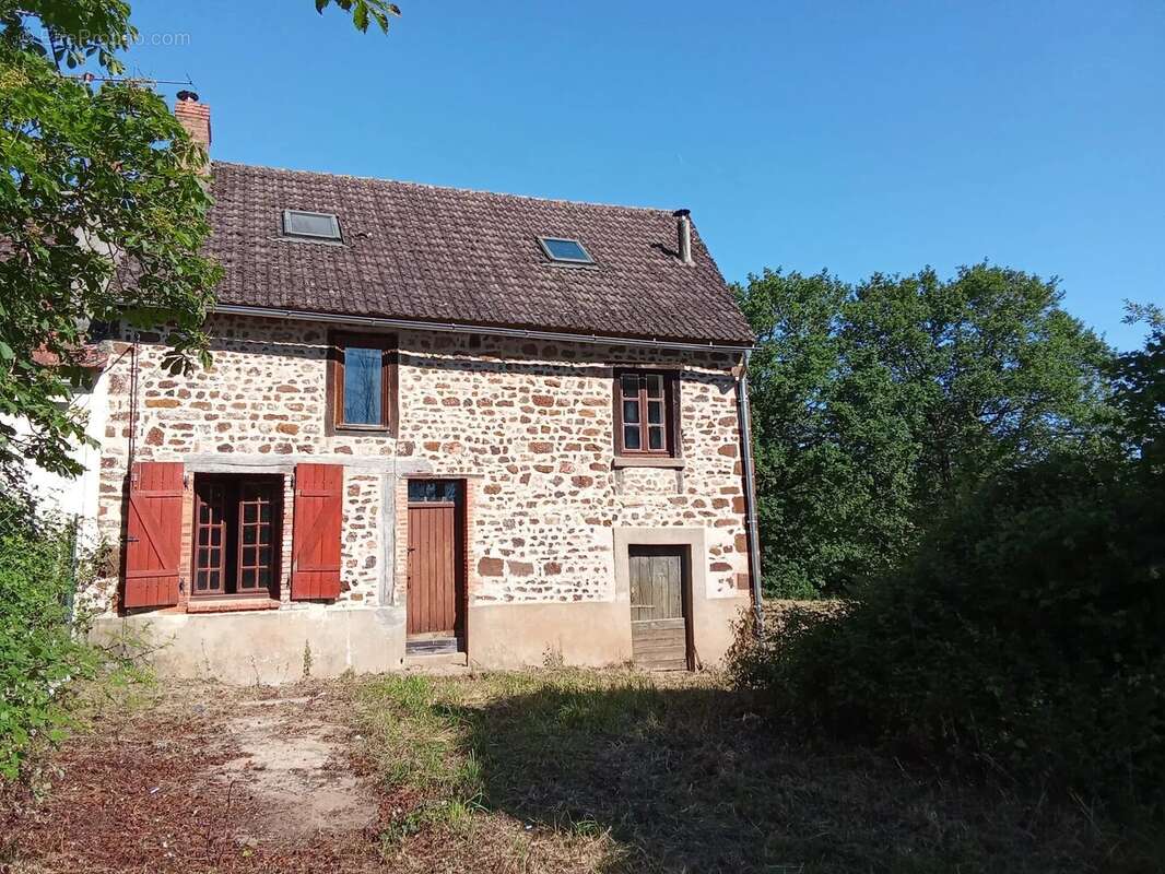 Une maison située dans un hameau, avec un grand jardin - photo 9