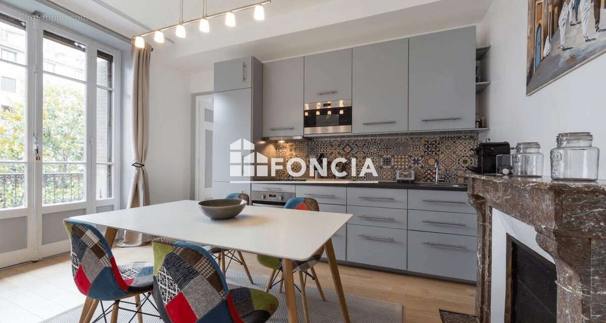 Annecy centre – T4 traversant de 84 m², balcons, parking et cave - photo 3