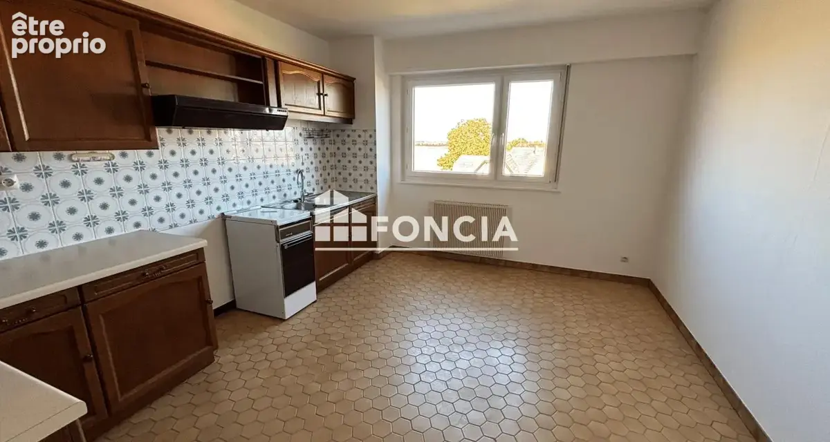 ERSTEIN Appartement traversant  88.33m2 avec vue dégagée, cave et garage - photo 3