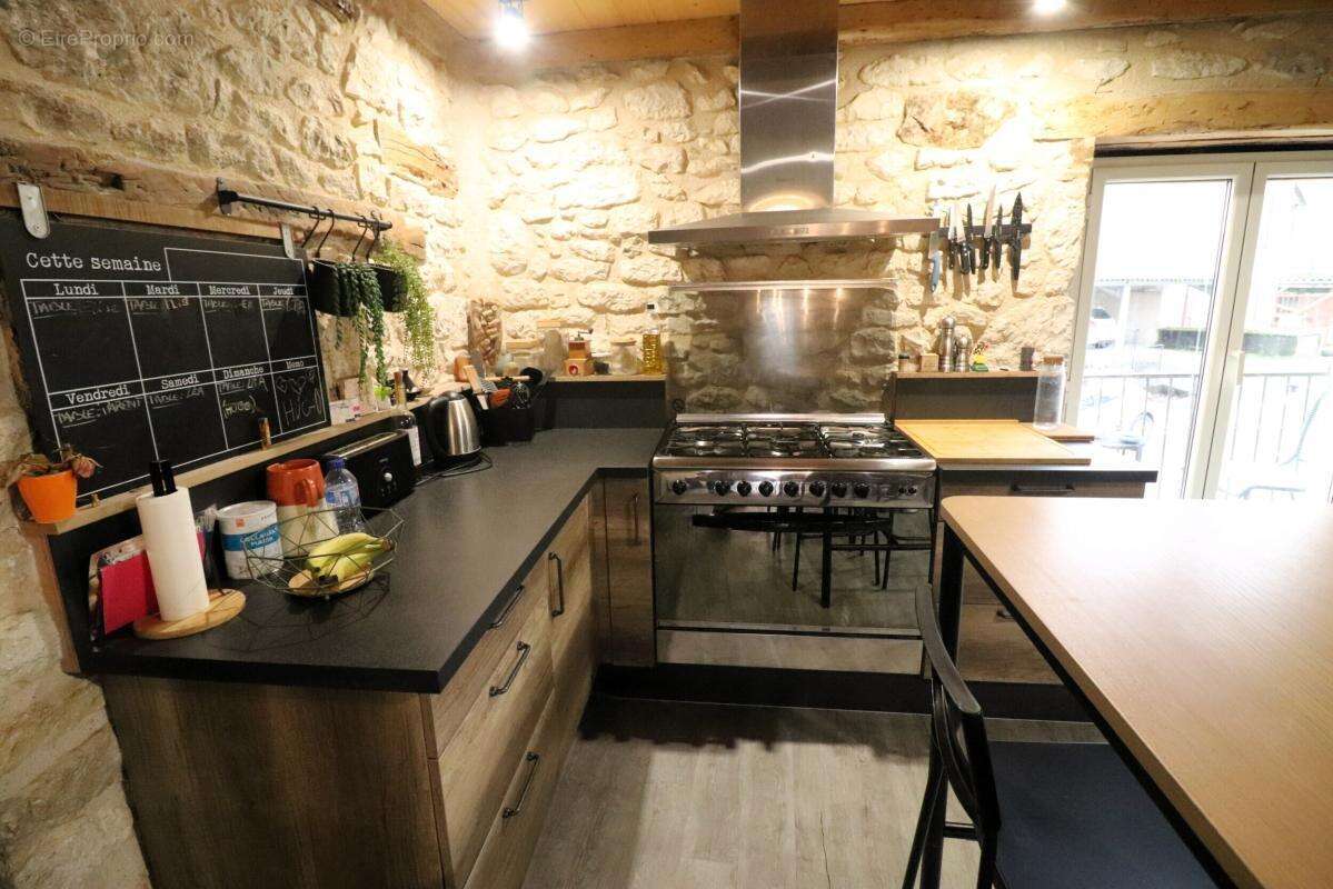 Maison à CASTELNAU-MONTRATIER