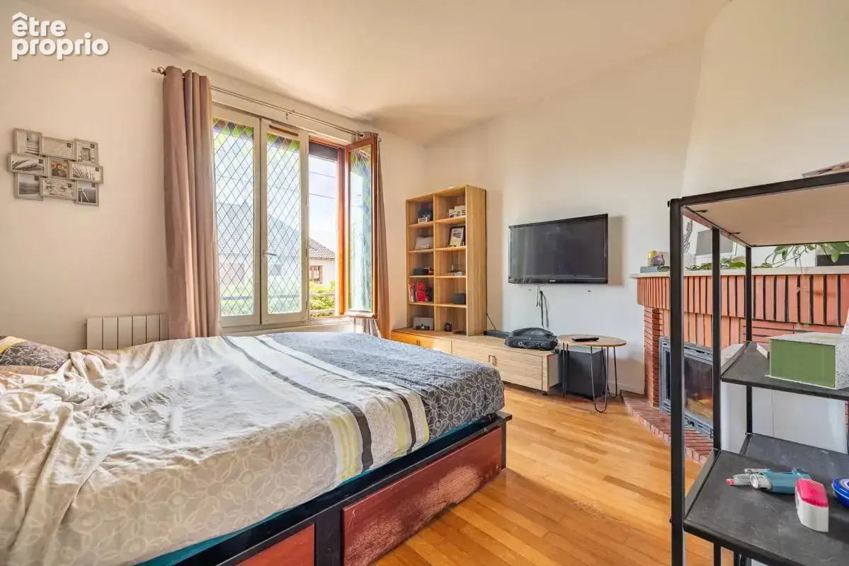 Maison de 7 pièces de 135 m² à Sainte-Geneviève-des-Bois - photo 6