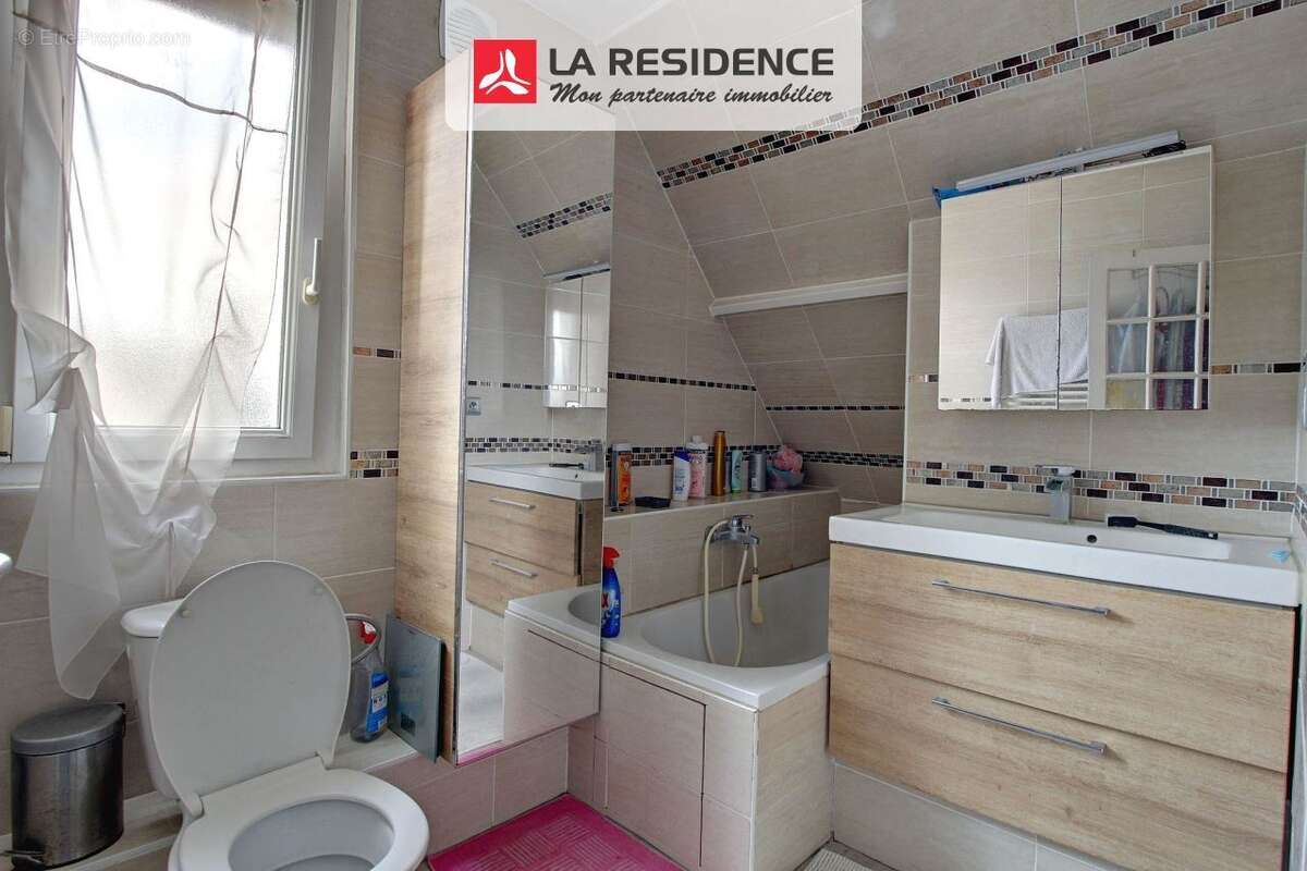 Maison 132 m² à Saint-Etienne-Du-Rouvray  - photo 9
