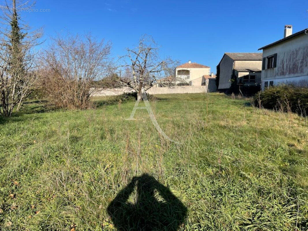 Terrain à PONT-L'ABBE-D'ARNOULT