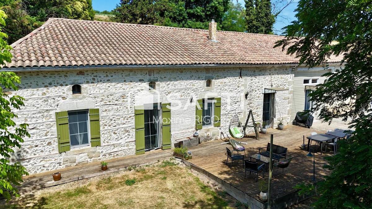 Photo 1 - Maison à CASTELNAU-SUR-GUPIE