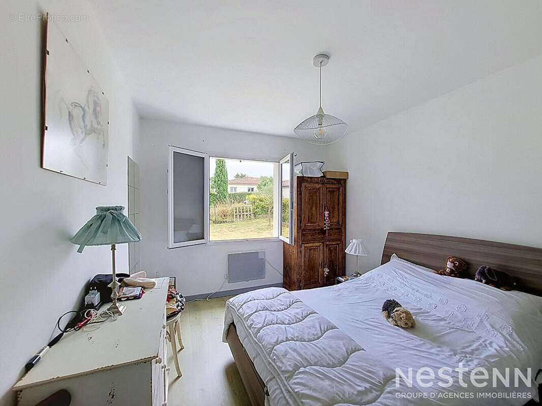 A Vendre Maison contemporaine de plain-pied avec trois chambres, garage et jardin à Condom - photo 10