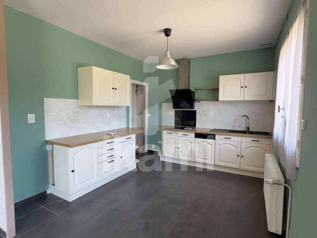 Maison fonctionnelle 4 pièces avec jardin - photo 4