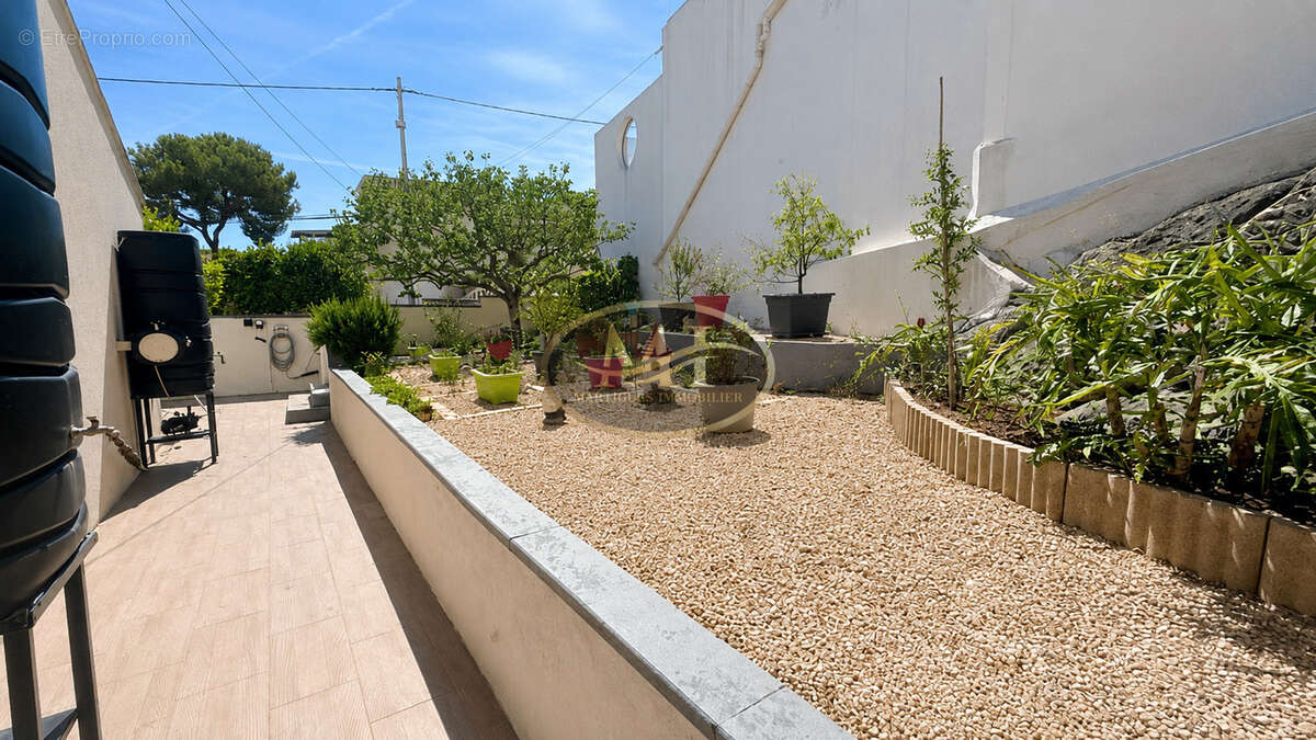 Maison T4 de plain-pied avec garage sur terrain arboré de 586 m2 - photo 5