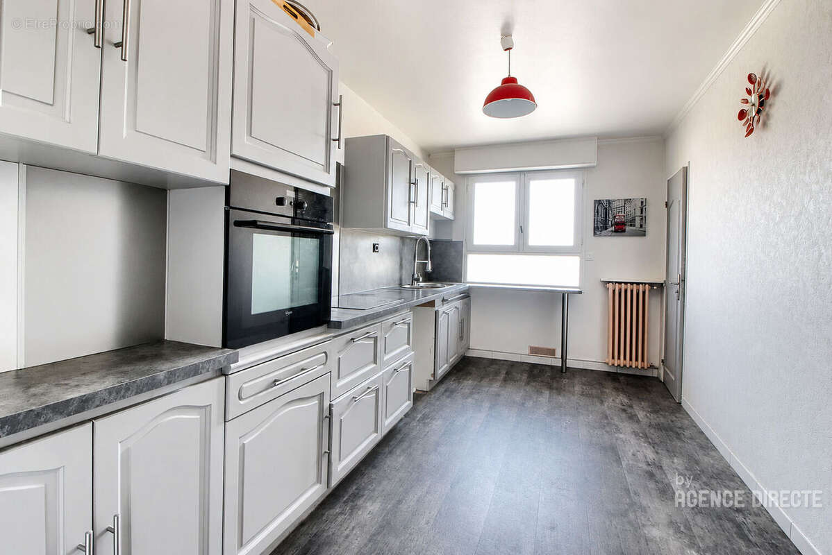 Appartement Rennes 4 pièce(s) 100.9 m2 avec cave et parking - photo 3