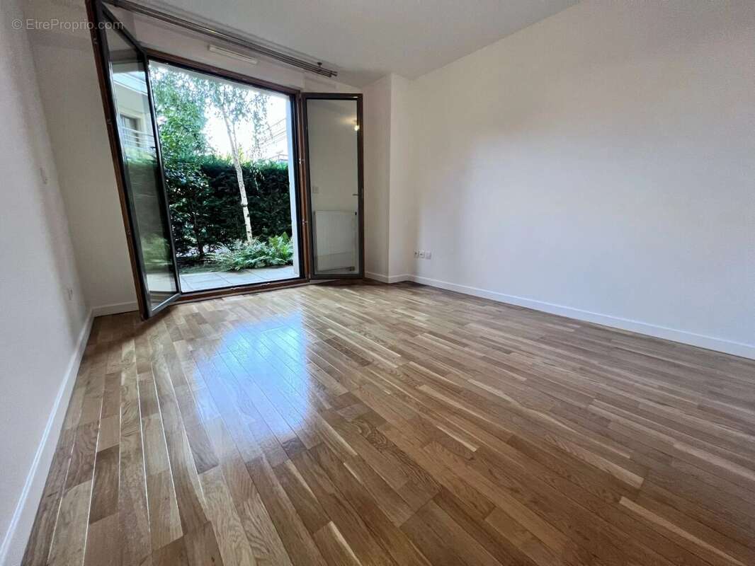 Chaville rive droite - 2p jardin privatif box - photo 8