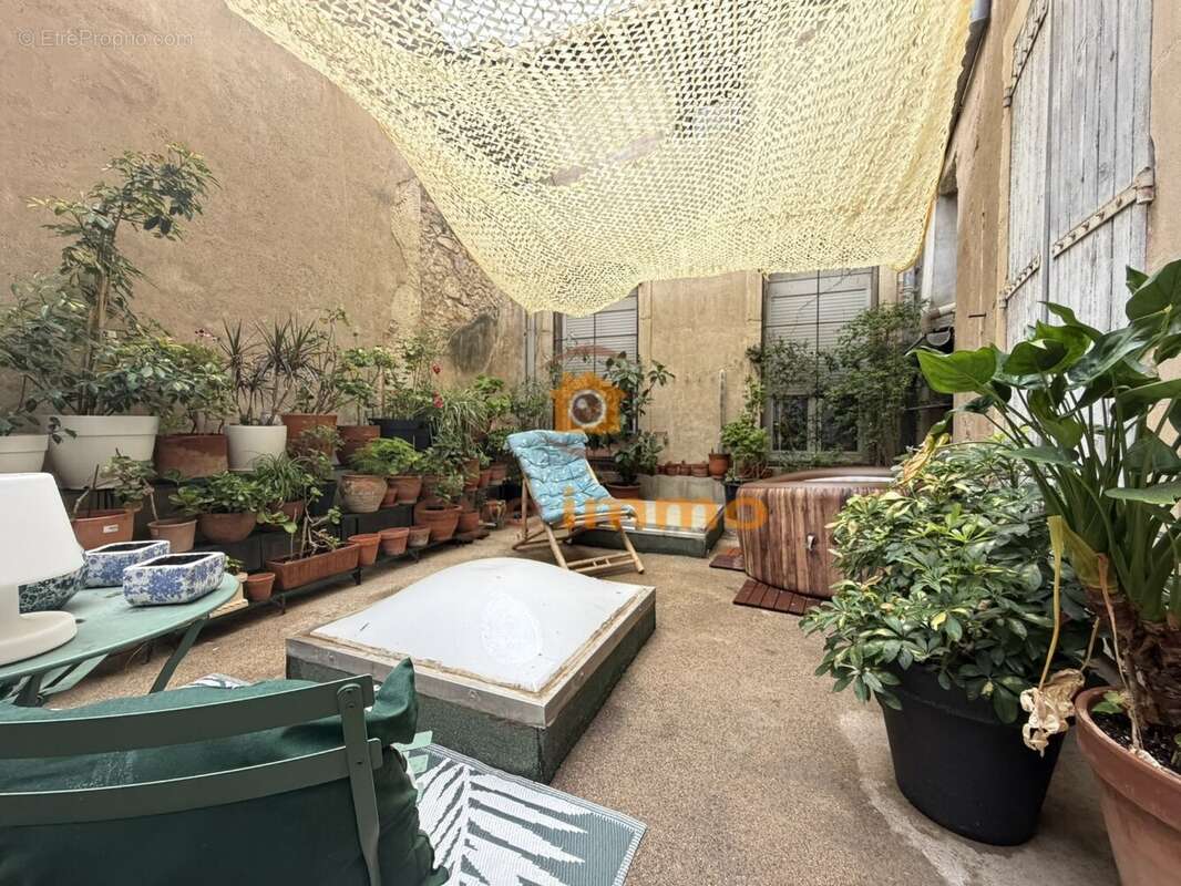 Appartement Haussmanien au centre de Béziers - photo 3