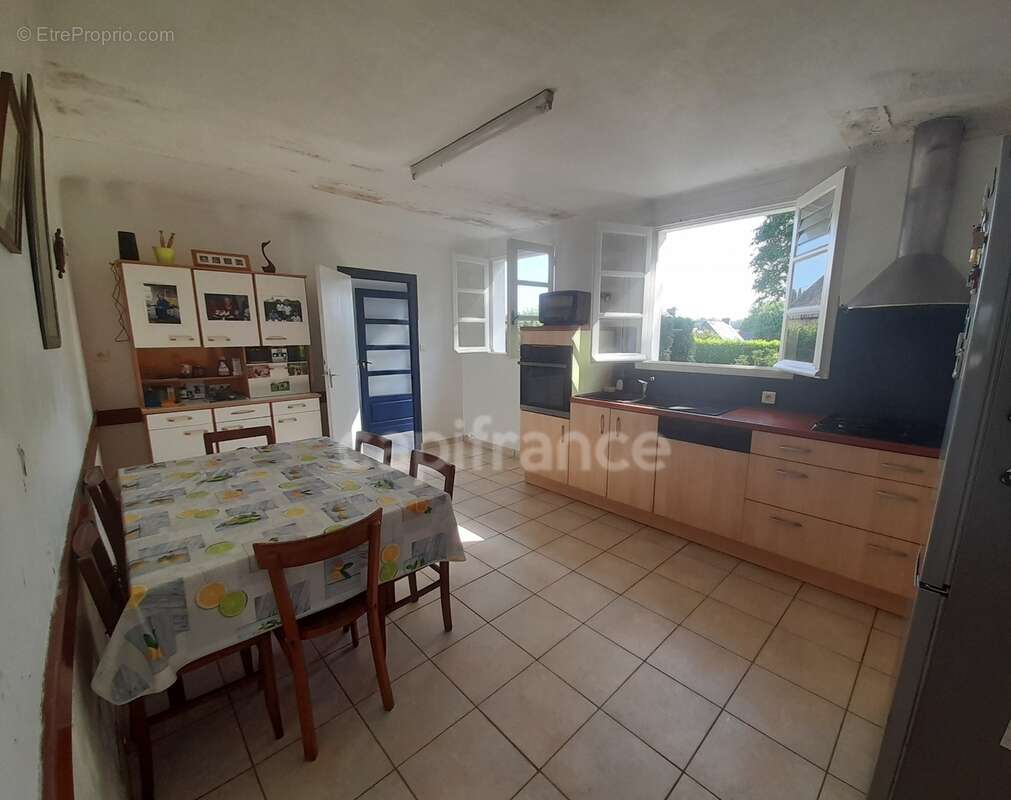Maison à vendre 4 pièces PLOGONNEC (29180)- Surface habitable 131.82 m2 -parcelle de 13963m2 + bois de 9018m2- Dépendances - photo 5