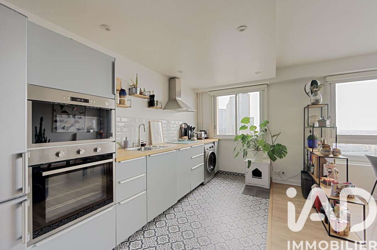 Photo 9 - Appartement à COURBEVOIE
