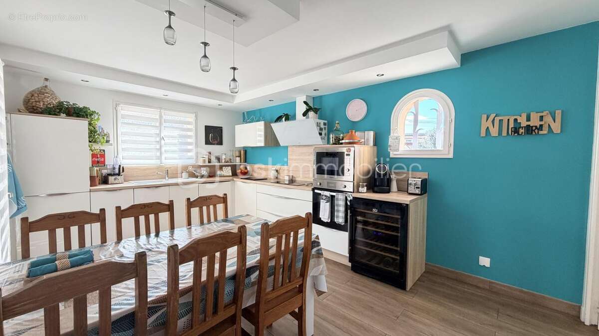 Maison plain pied quatres faces avec terrain et garage - photo 4