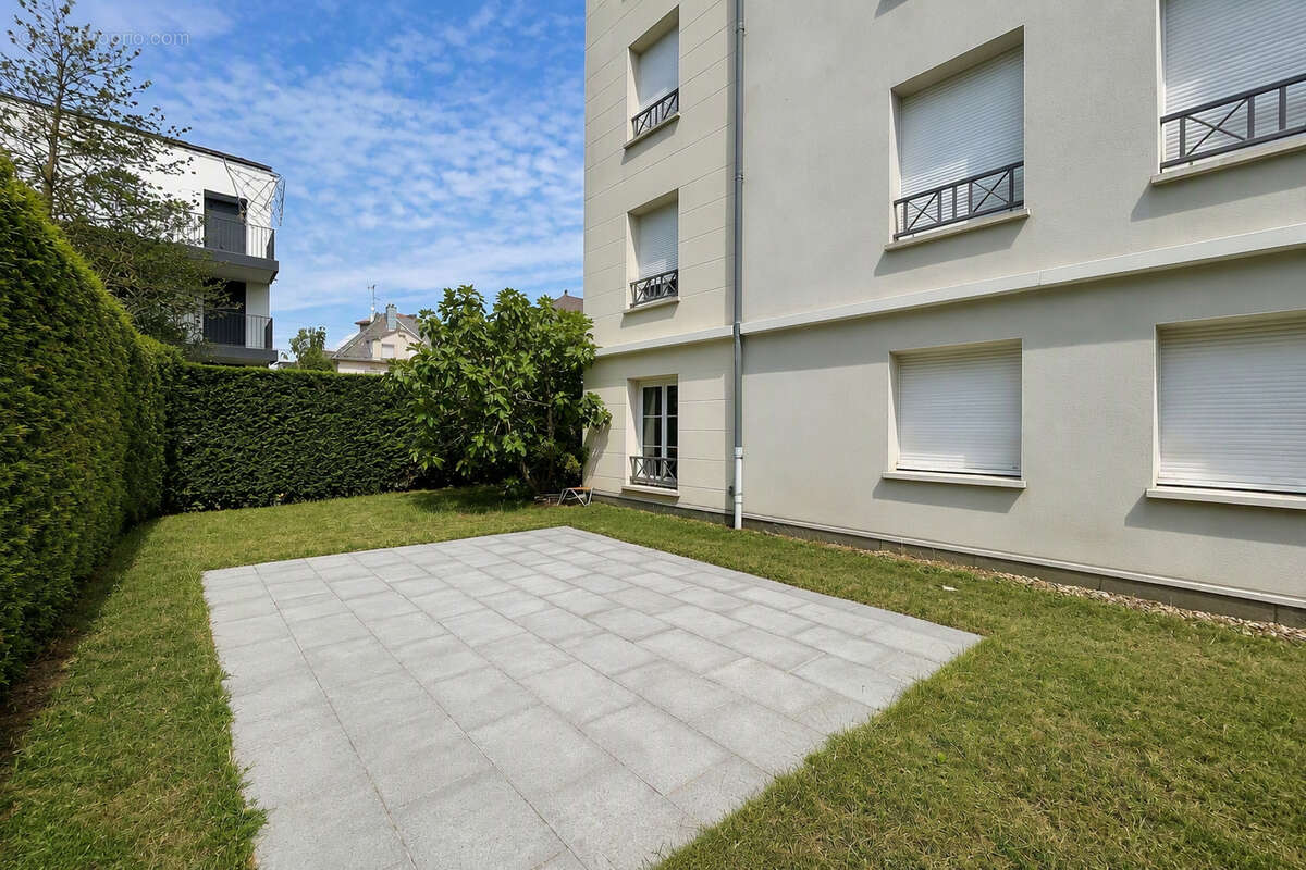 Appartement en rez-de-jardin avec garage, parking, cave, terrasse et jardin - photo 8