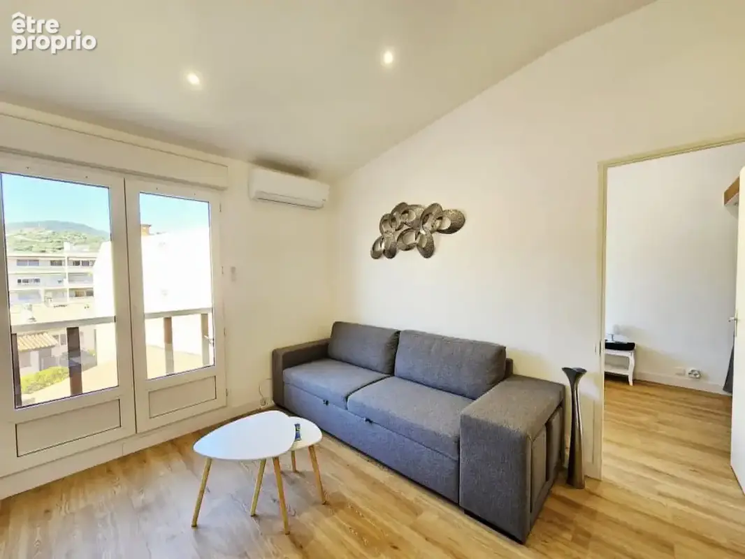 Appartement T2/3 rénové centre ville dernier étage - photo 4
