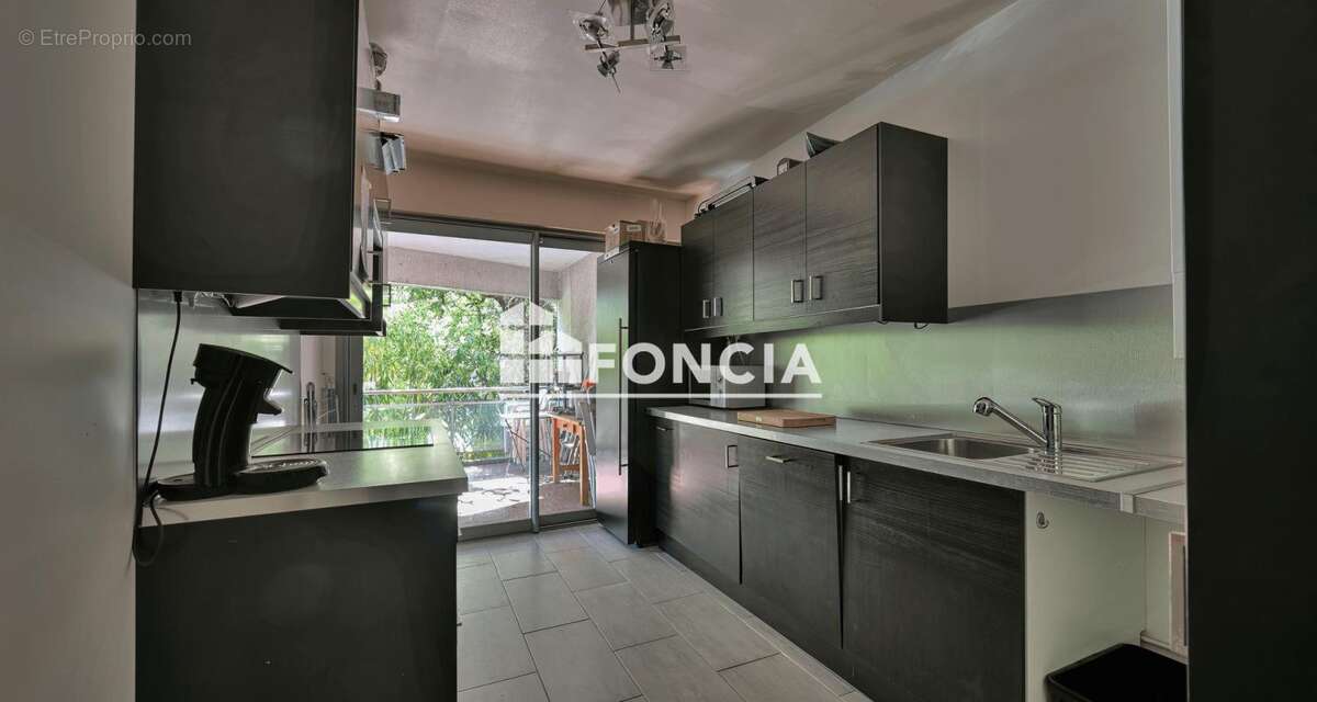 Appart f2 de 57 m2 avec terrasse de 21 m2 + cave et garage - photo 10
