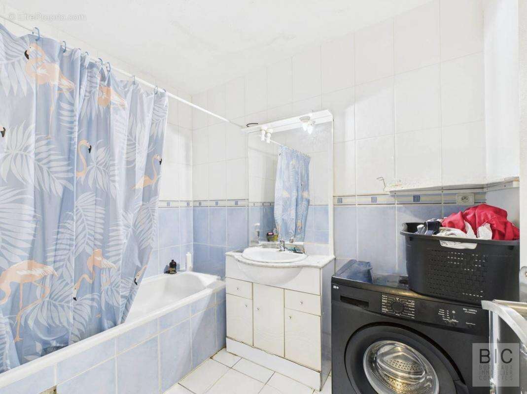 A vendre T2 loué avec cave et parking - photo 6