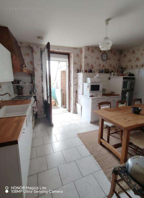 AZE maison ancienne très bien entretenue avec puits et garage - photo 2