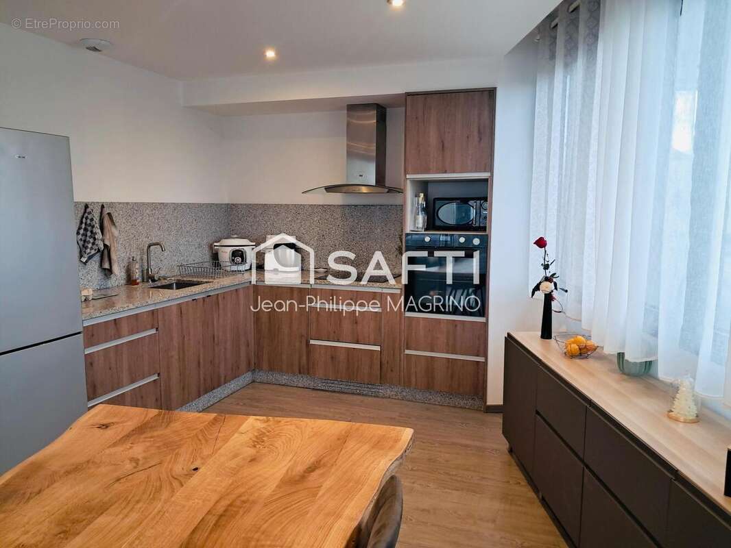 Photo 2 - Appartement à LA BASTIDE-DE-BOUSIGNAC