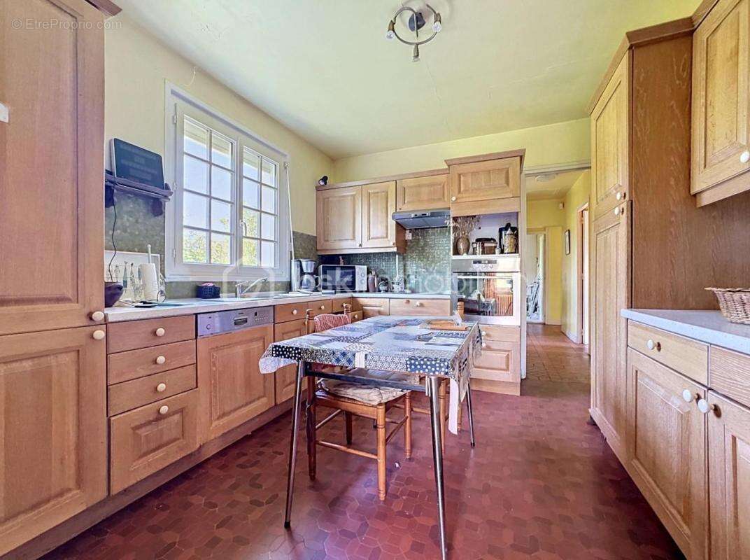 Grande maison sur sous-sol + terrain 1000m² constructible - photo 6