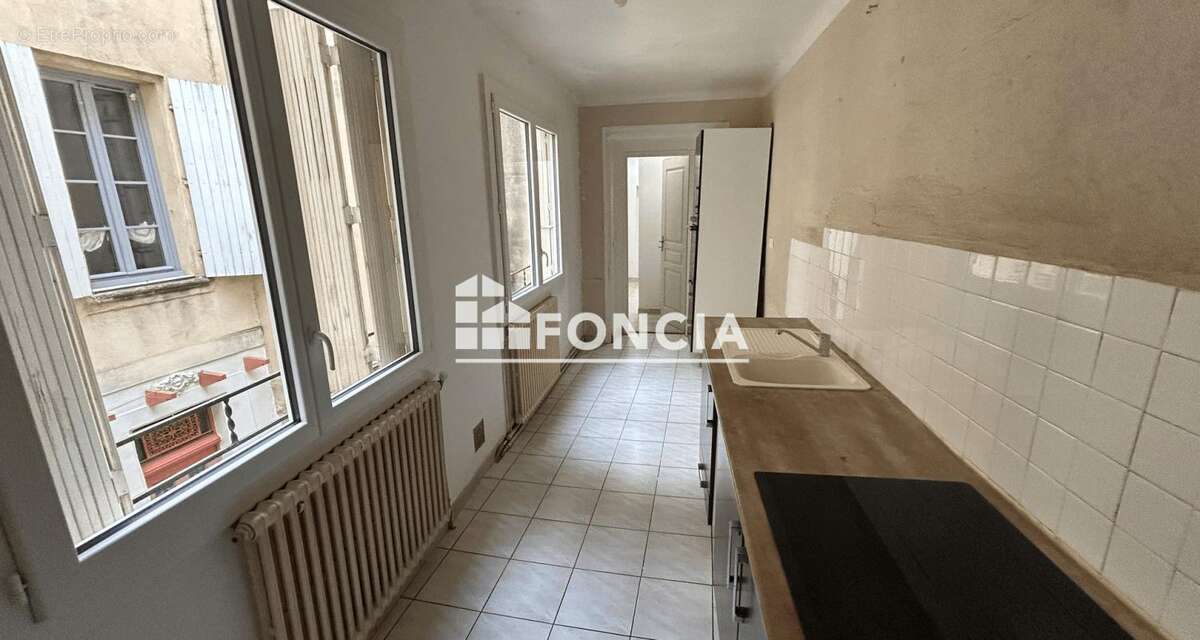 Carpentras centre-ville – Appartement T2 de 52 m² loué – Investissement locatif - photo 2