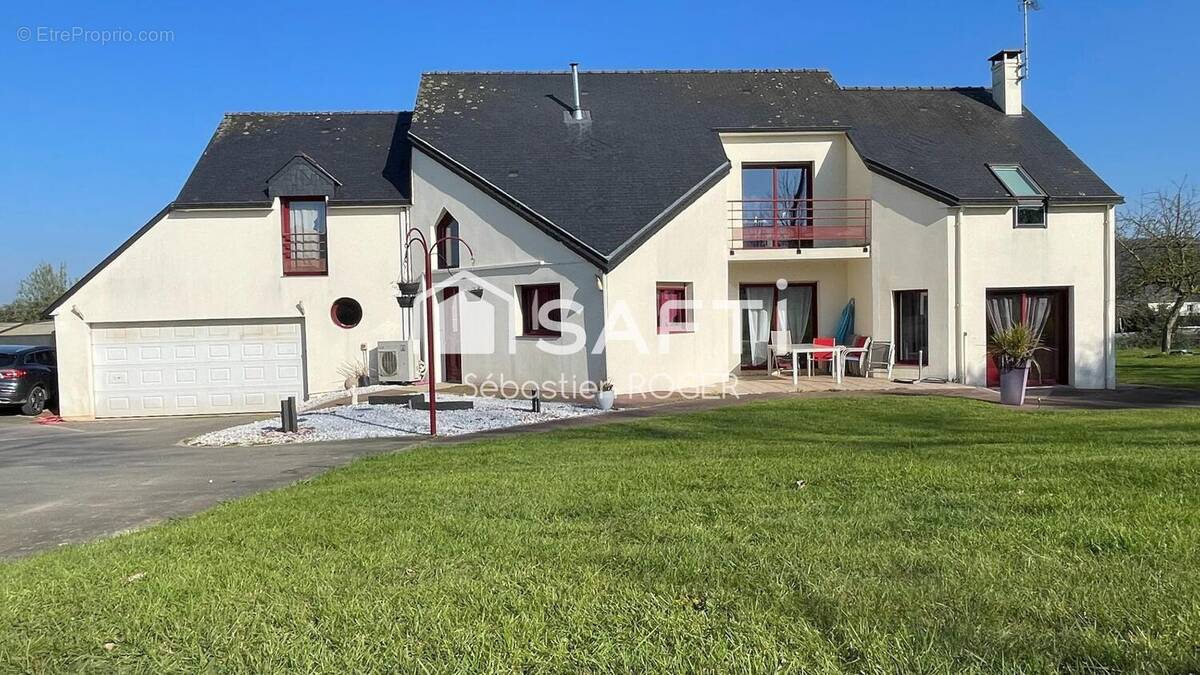 Photo 1 - Maison à LA HAIE-TRAVERSAINE
