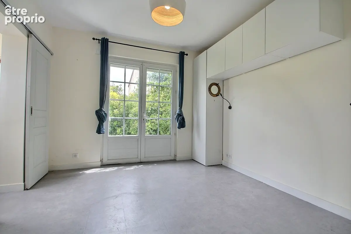 Maison de 5 pièces de 107m² avec jardin et parking - photo 7