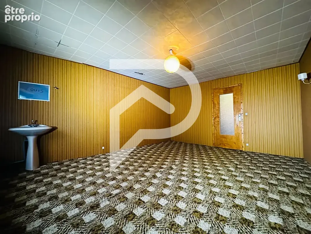 Maison de plein pied 5 pièce(s) 135 m² situé à Aingeray - photo 6