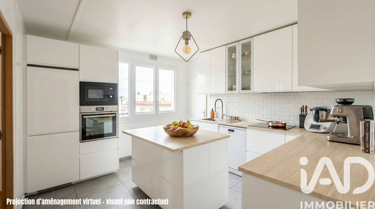 Photo 4 - Appartement à COURBEVOIE